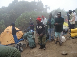 Arriving in camp to a welcome from the porters