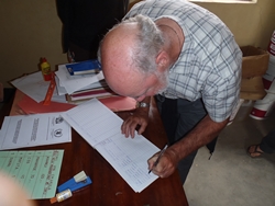 Kevin signs the guest book